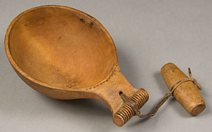 carved wooden cup with handle