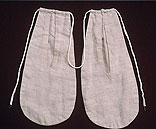 white cotton or linen pockets on a drawstring
