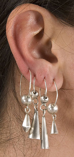 four silver earrings