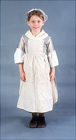 girl wearing white apron over her dress.