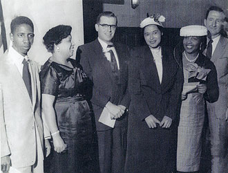 file:/activities/oralhistory/cappics/loving1945_rosa, alt: Rosa Parks stands with Ruth Loving and four other people.