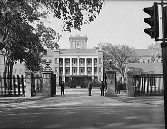 file:/activities/oralhistory/cappics/pryor1941_armory, alt: B/W photo of main entrance to armory building