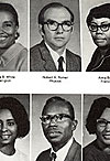 picture of Romer in college yearbook surrounded by black faculty members